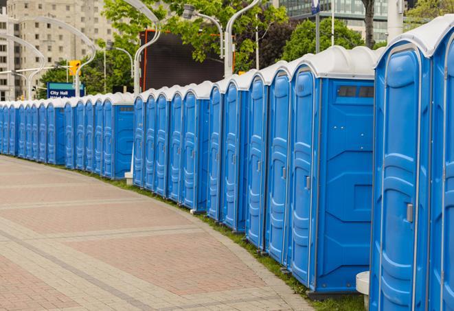 a row of portable restrooms at a fairground, offering visitors a clean and hassle-free experience in coraopolis